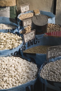 Athens, Attica, Greece. Sacks of beans for sale displayed on market food stall. Greece Greek Europe