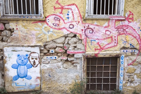 Athens, Attica, Greece. Graffiti on wall of building in the Plaka which lies beneath the Acropolis.