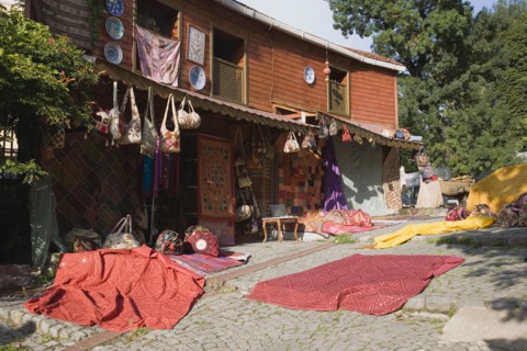 Istanbul, Turkey. Sultanahmet. Textiles and souvenirs displayed for sale next to Hagia Sophia.