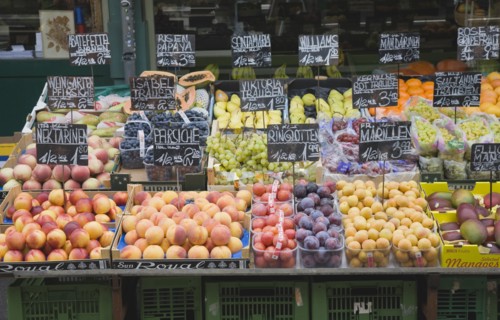Vienna, Austria. The Naschmarkt. Display of fresh fruit for sale on market stall including