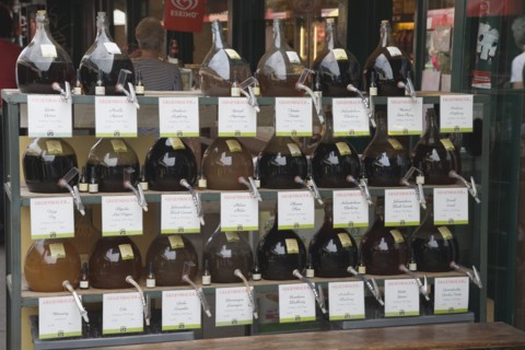 Vienna, Austria. The Naschmarkt. Display of Federweisser wine in the fermentation stage known as
