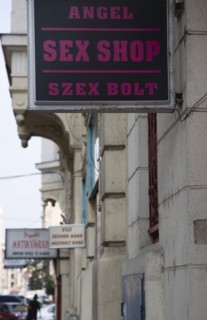 Budapest, Pest County, Hungary. Sign for sex shop at the rail terminus Budapest Nyugati palyaudvar.