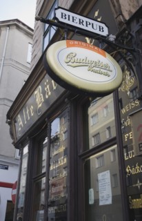 Vienna, Austria. Angled view of pub facade with hanging beer signs. Austria Austrian Republic