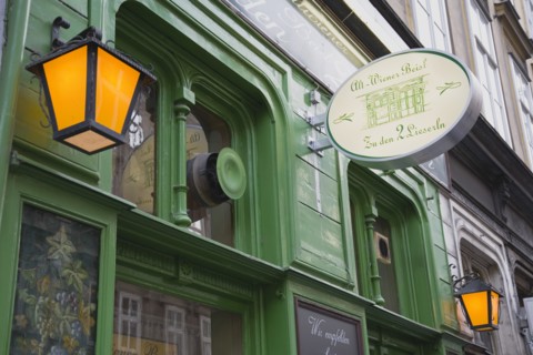 Vienna, Austria. Art Nouveau facade painted green with decorative metal lanterns. Austria Austrian