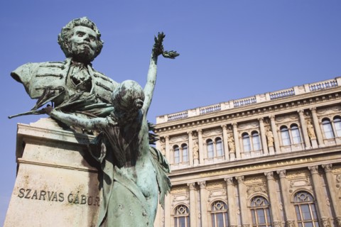 Budapest, Pest County, Hungary. Bronze portrait bust of Szarvas Gabor in front of the Hungarian