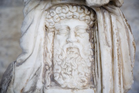 Athens, Attica, Greece. Carved bearded head thought to be that of Zeus King of the Gods the ruler