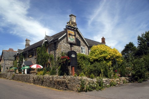 England, Devon, Upottery, Public House exterior with walled beer garden