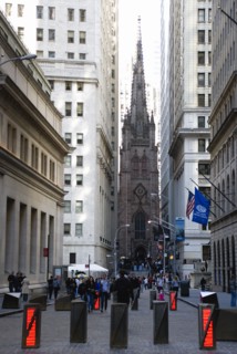 USA, New York, New York City, Manhattan  People walking in Wall Street by security barriers in the