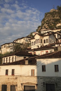 Albania, Berat, Traditional Ottoman buildings on hillside in old town.