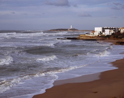 Spain, Andalucia, Cadiz, Cape Trafalgar and Los Canos de Meca village apartments overlooking beach