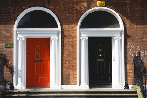 Ireland, County Dublin, Dublin City, Red and black Georgian doors in the city centre south of the