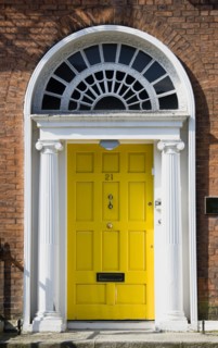 Ireland, County Dublin, Dublin City, Yellow Georgian door in the city centre south of the Liffey