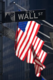 USA, New York, New York City, Manhattan  Road signs for Wall Street and Broad Street with American