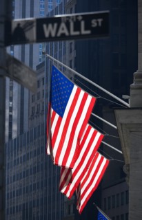 USA, New York, New York City, Manhattan  Road signs for Wall Street and Broad Street with American