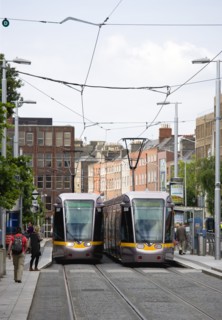 Ireland, County Dublin, Dublin City, Luas light rail trams at stop beside Saint Stephens Green with