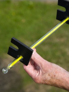 Climate, Weather, Measurements, Weather observer reading the thermometer that measures grass