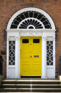 Ireland, County Dublin, Dublin City, Yellow Georgian door in the city centre south of the Liffey