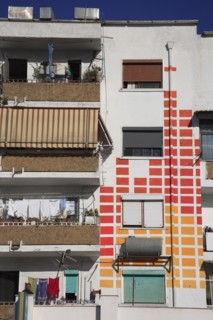 Albania, Tirane, Tirana, Detail of exterior facade of apartment block with pattern painted on walls