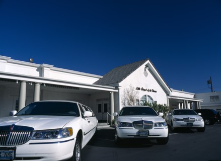 USA, Nevada, Las Vegas, Little Chapel of the Flowers  Wedding Chapel with three white limousines