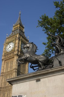 England, London, Westminster, Angled view looking up at Big Ben clock tower with the Boadicea