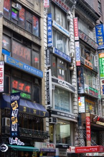 USA, New York, New York City, Manhattan  Korean signs for restaurants and shops on buildings in