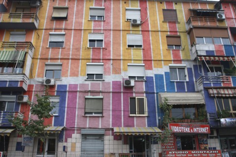 Albania, Tirane, Tirana, Exterior facade of striped  multi-coloured apartment block with windows