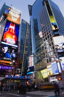 USA, New York, New York City, Manhattan  People walking at night in Times Square at the junction of
