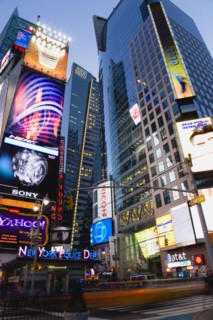 USA, New York, New York City, Manhattan  People walking at night in Times Square at the junction of