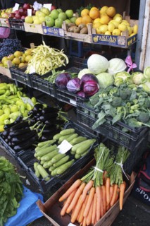 Albania, Tirane, Tirana, Display of fruit and vegetables including aubergines  carrots and cabbage