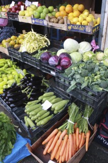Albania, Tirane, Tirana, Display of fruit and vegetables including carrots  aubergine and cabbage