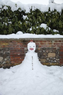 Weather, Winter, Snow, Snowman made against wall.