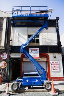 Ireland, County Dublin, Dublin City, Raised hydraulic cherry picker platform used by decorators