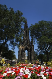 Scotland, Lothian, Edinburgh, Scott Monument in Princes Street with flower beds in the foreground
