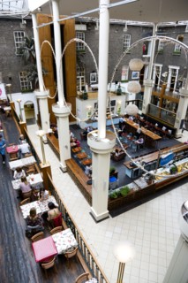Ireland, County Dublin, Dublin City, Powerscourt Centre restaurants with people at tables beside
