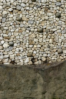Ireland, Meath, Newgrange, Close up detail of the retaining wall around the front of the historical