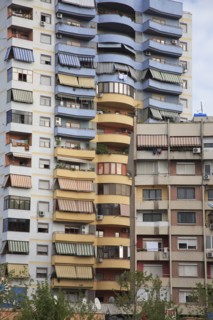 Albania, Tirane, Tirana, Part view of exterior facade of apartment block.