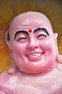 Colourful pink Buddha in Guan Yin Temple near Dali. Photo: Mel Longhurst