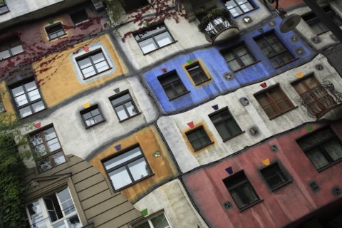 The Hundertwasser-Krawinahaus angled part view of exterior facade of apartment building. Photo: