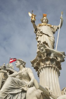 Statue of Athena raised on pillar above fountain in front of the Parliament building. Photo: