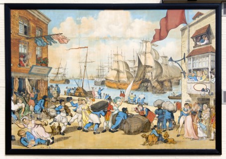 The Camber in Old Portsmouth showing the Bridge Tavern mural of Thomas Rowlansons cartoon titled