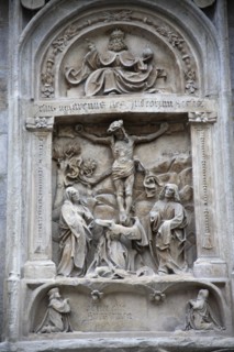Stone carving of the crucifixion on the outside of the Stephansdom Cathedral. Photo: Bennett Dean