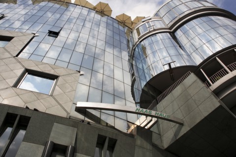 Exterior detail of the Haas Building or Haas Haus. Modern glass fronted and concrete office