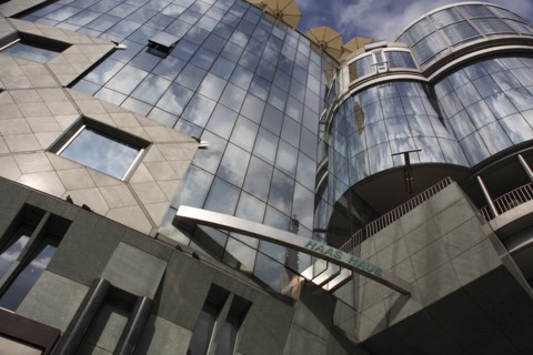 Exterior detail of the Haas Building or Haas Haus. Modern glass fronted and concrete office