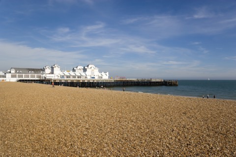 South Parade Pier built in 1908 on the seafront in Southsea with the pebble shingle beach. Photo:
