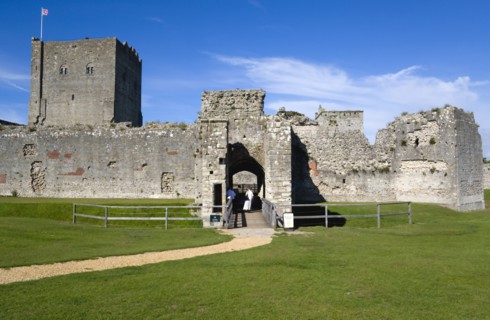 Portchester Castle showing the Norman 12th Century Tower and 14th Century Keep beyond the bridge