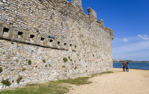 Portchester Castle Norman 12th Century flint walls with the garderobe chutes or toilets from the