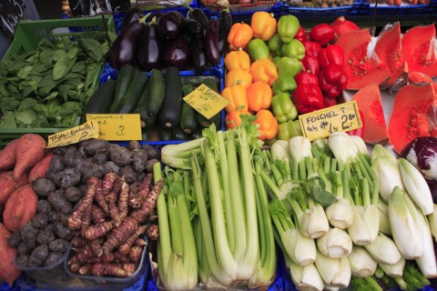 Vegetable stall in the Naschmarkt. Cropped view of display of produce including fennel celery