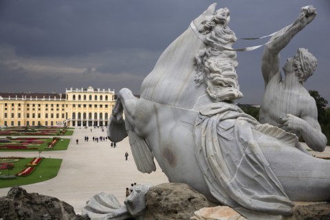 Detail from the Neptune Fountain with the Schonnbrunn Palace in the background. Photo : Bennett