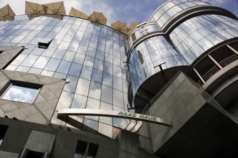 Exterior detail of the Haas Building or Haas Haus. Modern glass fronted and concrete office