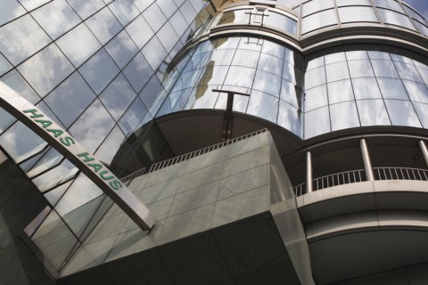 Exterior detail of the Haas Building or Haas Haus. Modern glass fronted and concrete office